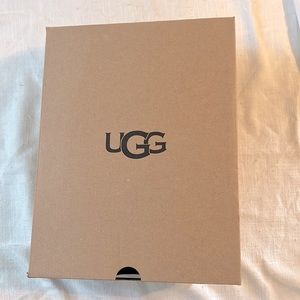 Ugg Black “fluff yeah” slides.